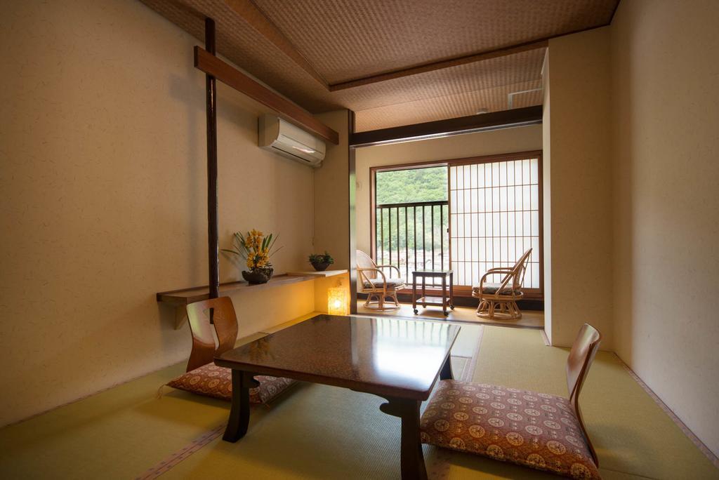 Отель Yamamizuki Urara Tsutaya Кисо Номер фото